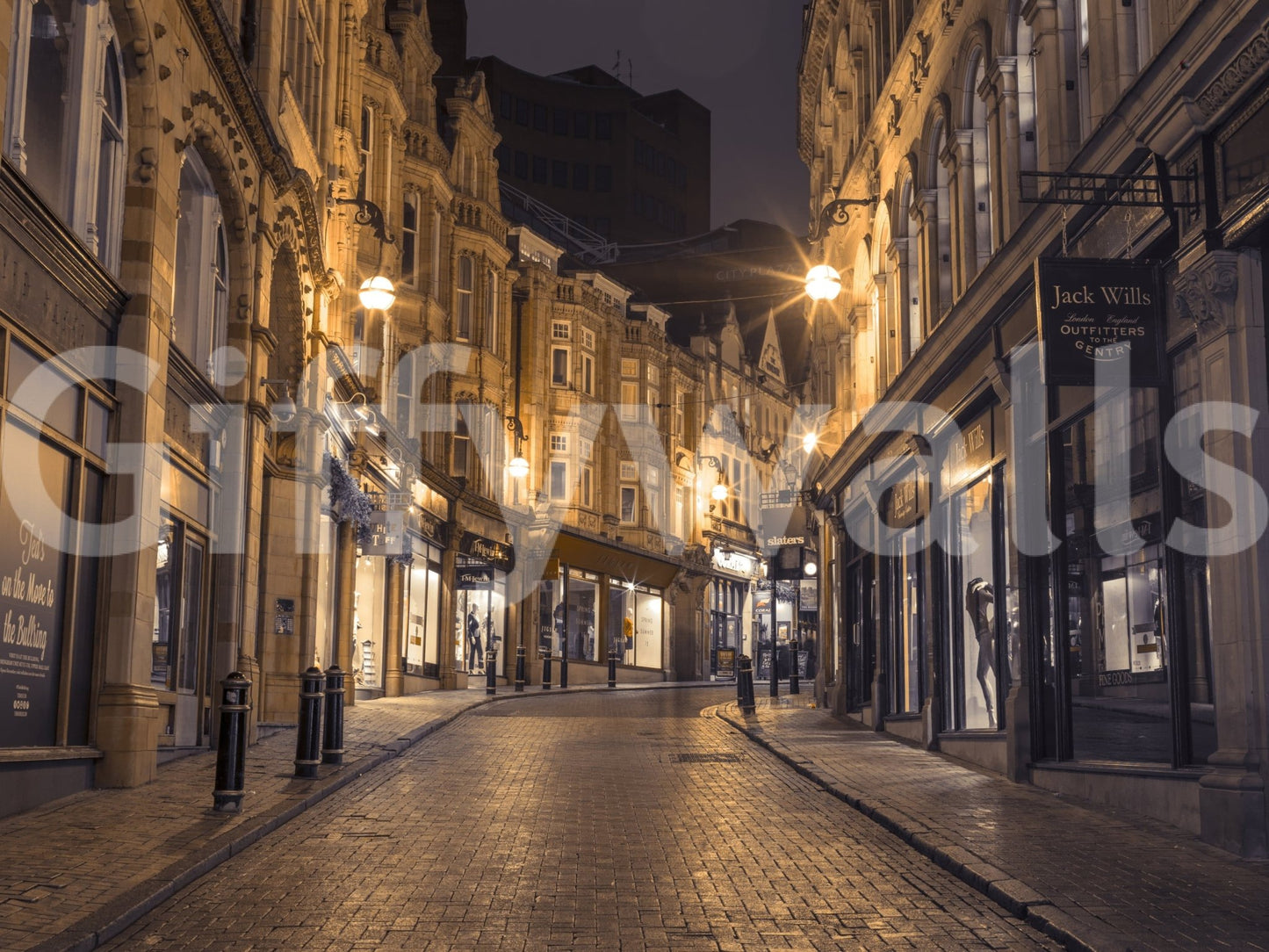Cobblestone Street Nights wallpaper mural shown as a full-wall view of a lamplit historic street at night