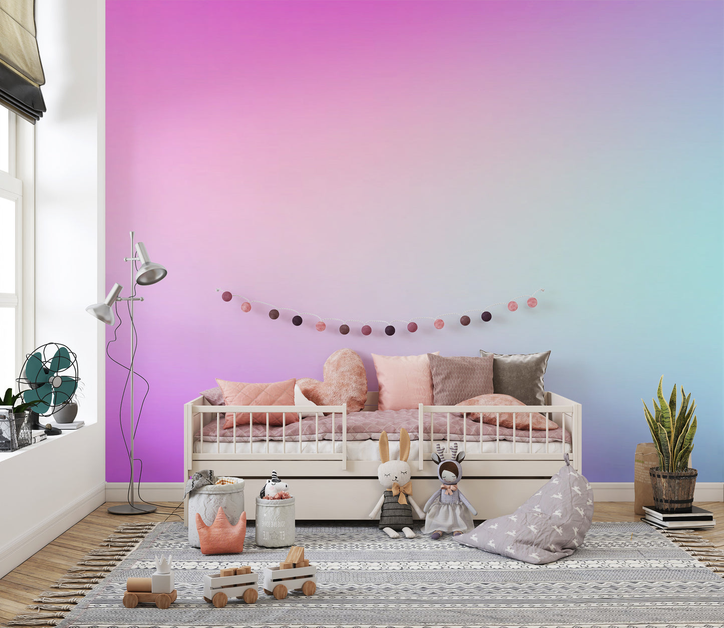 Cotton Candy Pastel Gradient wallpaper mural in pink and aqua in a kids room with a white daybed and plush toys