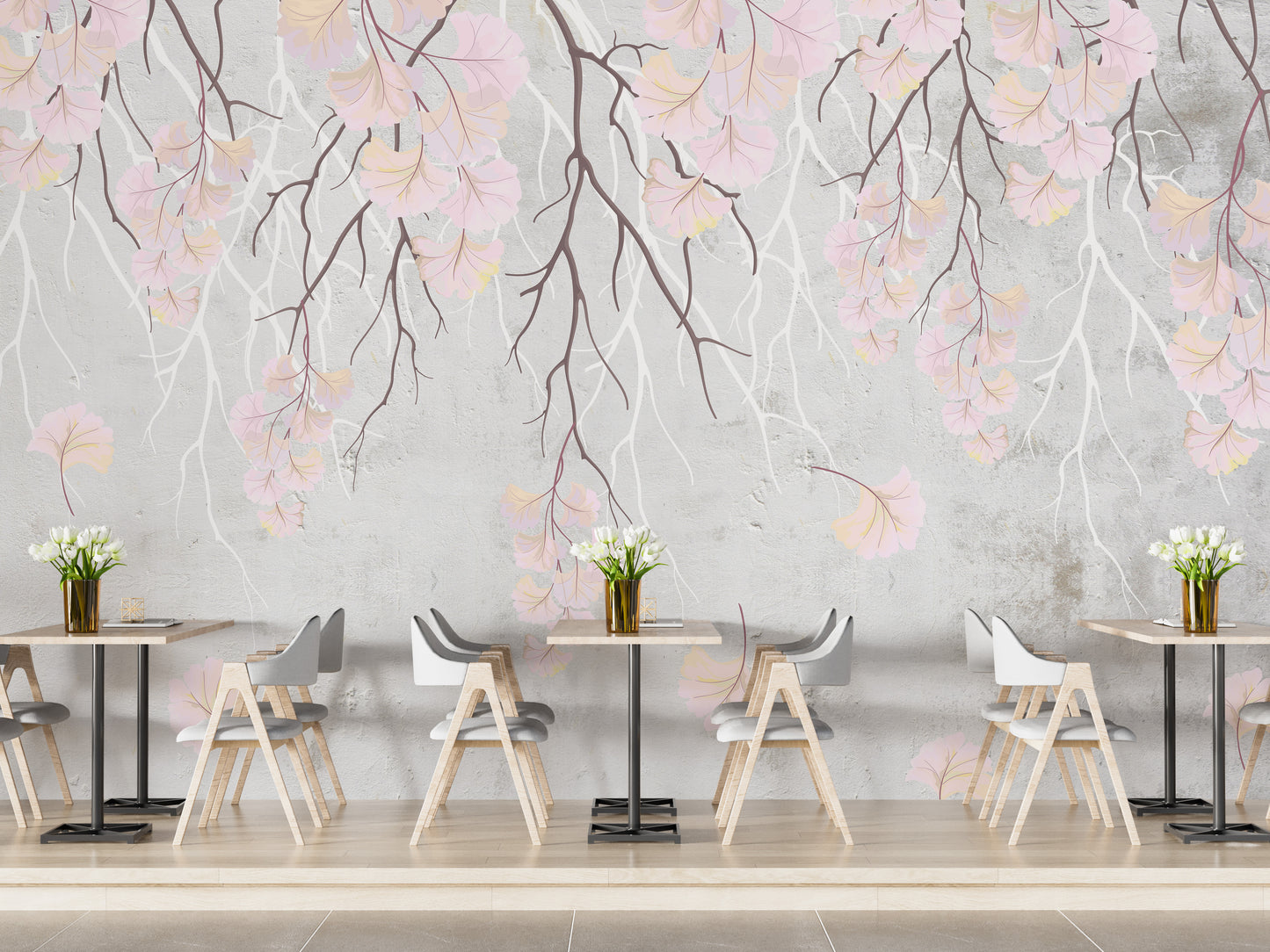 Hanging pink flowers wallpaper mural with pink blooms on grey behind cafe-style wood tables and grey chairs