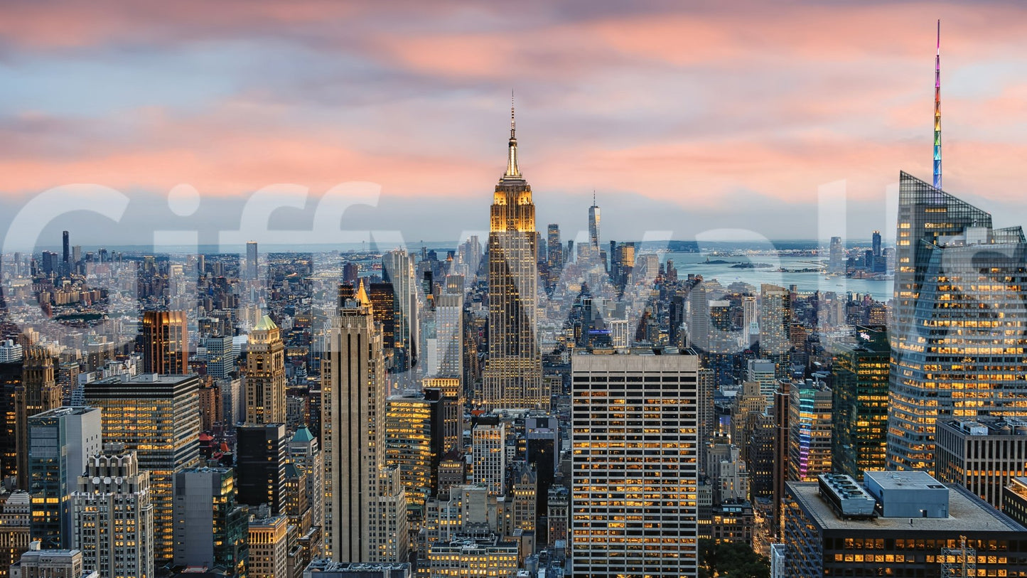 Manhattan Dawn wallpaper mural shown as a full-wall mural of the Manhattan skyline and Empire State at dusk