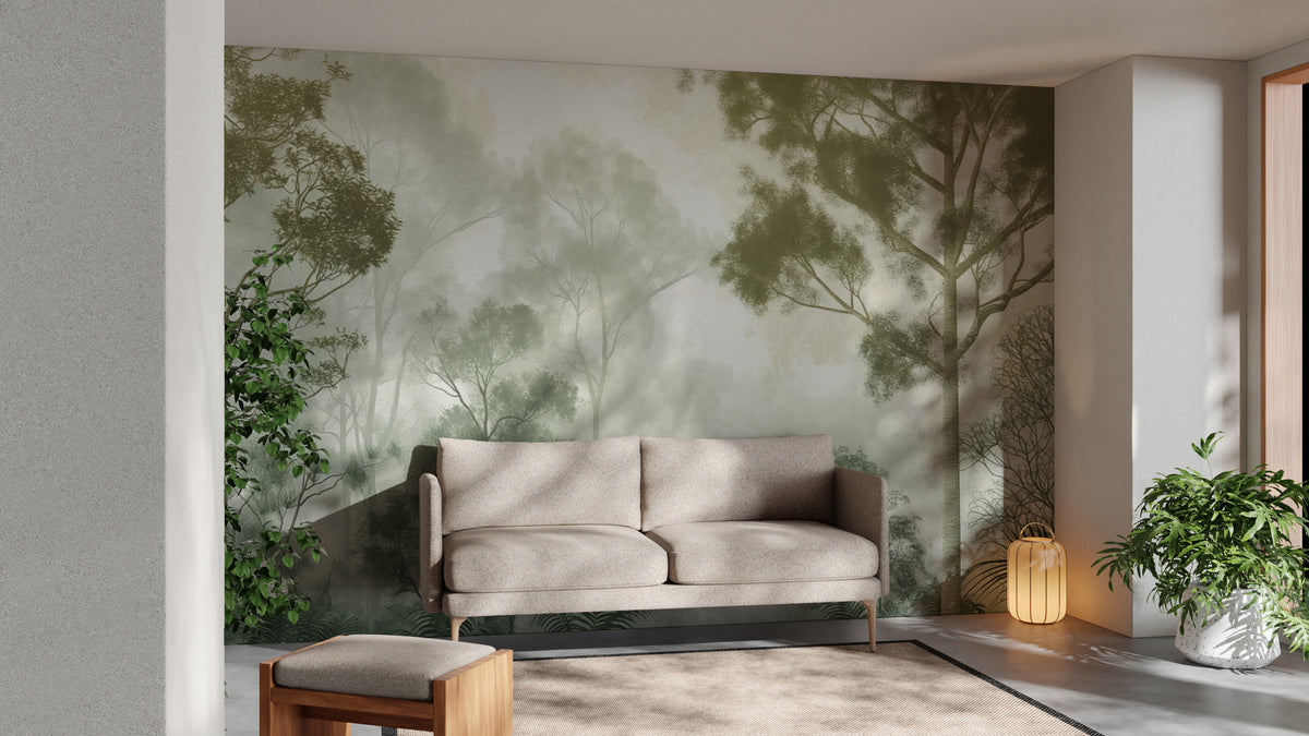 Misty Green Forest wallpaper mural with soft green trees in fog behind a beige sofa in a sunlit living room