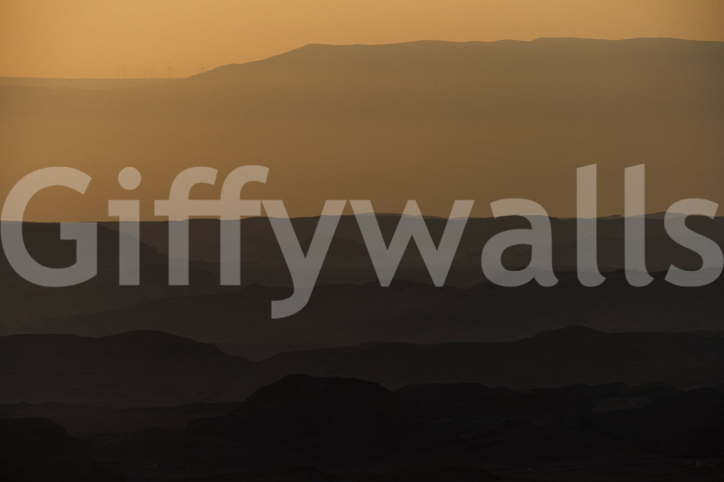 A detail of the warm tones in the desert and sky.