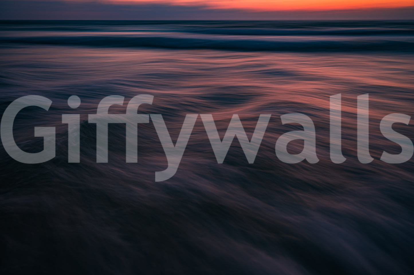 A detail of the warm tones in the water and sky.