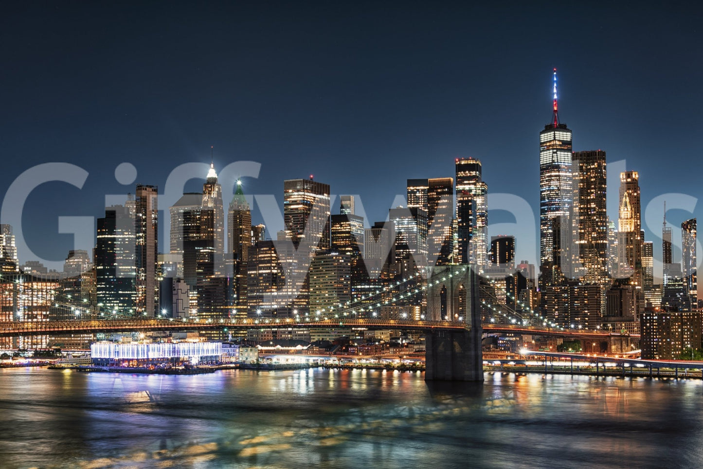 Urban Nightscape wallpaper mural showing the New York skyline, Brooklyn Bridge and river lights at night