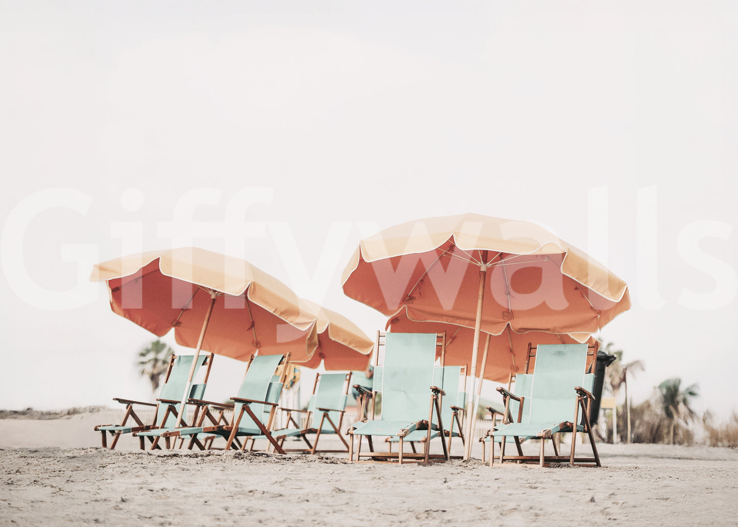 Scalloped sunshades sit closely together across the entire coastal wall mural