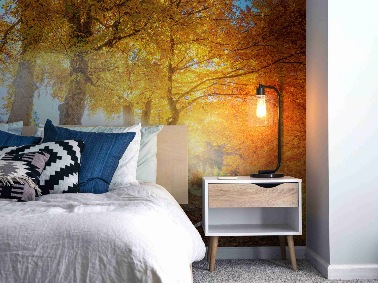 Autumn wallpaper mural with golden leaves, forest trees and warm woodland scene
