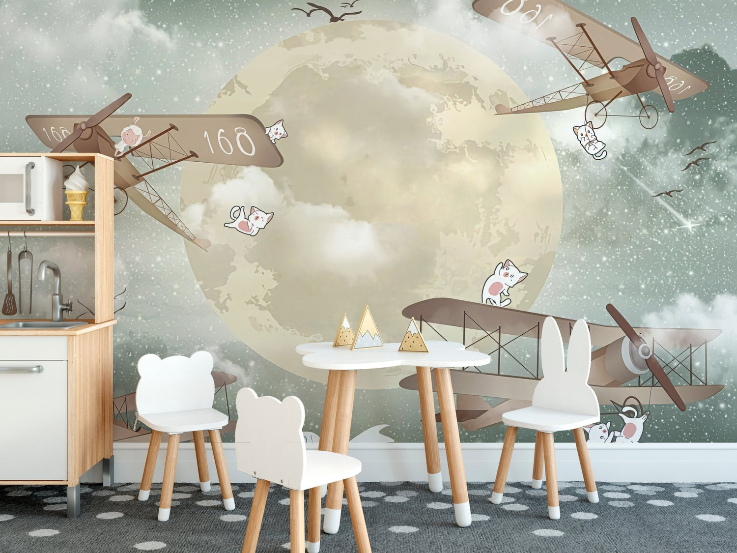 Cat wallpaper showing illustrated cats and kittens on a wall