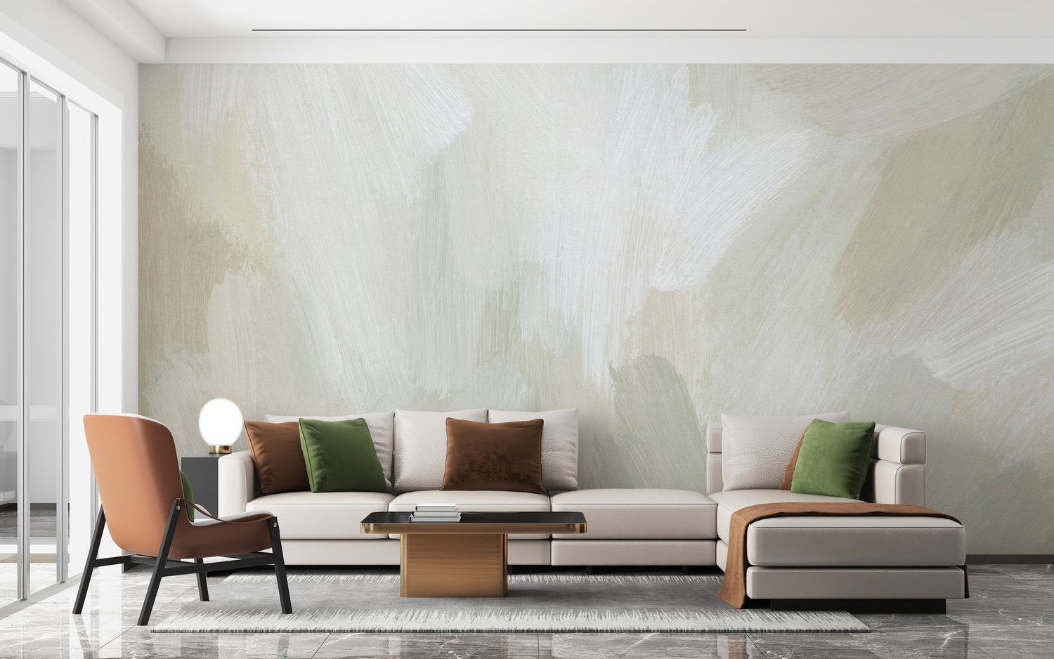 A bright, modern living room featuring a statement wall with blue and gold geometric living room wallpaper behind a grey sofa.