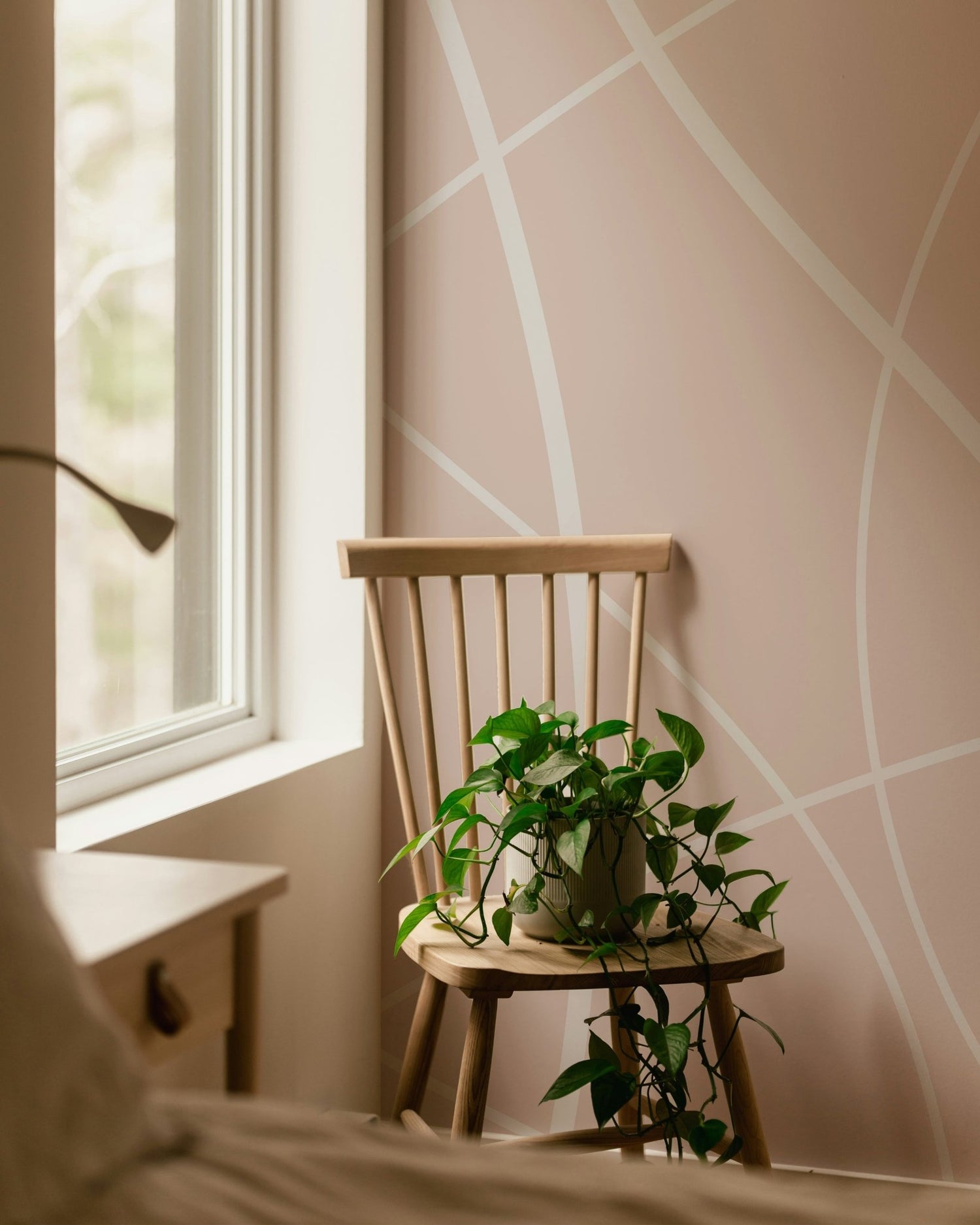 Curated wallpaper styles arranged across modern, vintage and boho rooms