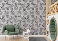 Adorable sloths on leafy branches wallpaper