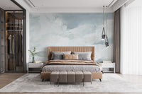 Watercolor clouds mural creates a dreamy bedroom retreat