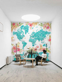 Watercolor-style world map in serene teal hues

