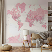 Dreamy pink map mural with soft watercolor tones

