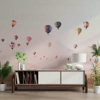 Floating air balloons mural with pastel hues

