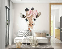 Adorable baby giraffe with bow wallpaper mural