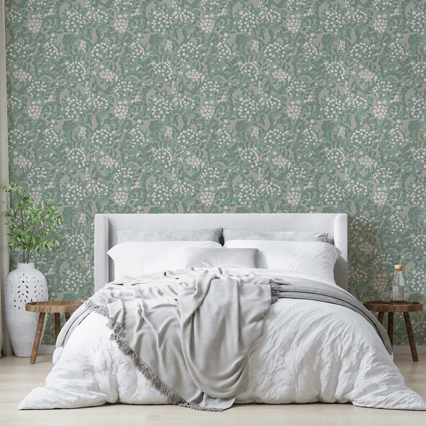 Coastal-inspired green wallpaper with foliage

