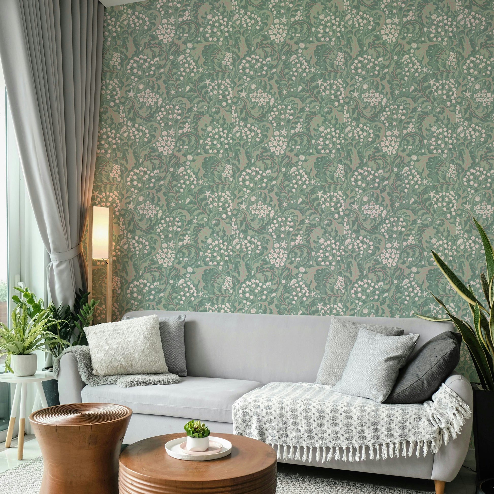 Soft green wallpaper with organic sea kale pattern

