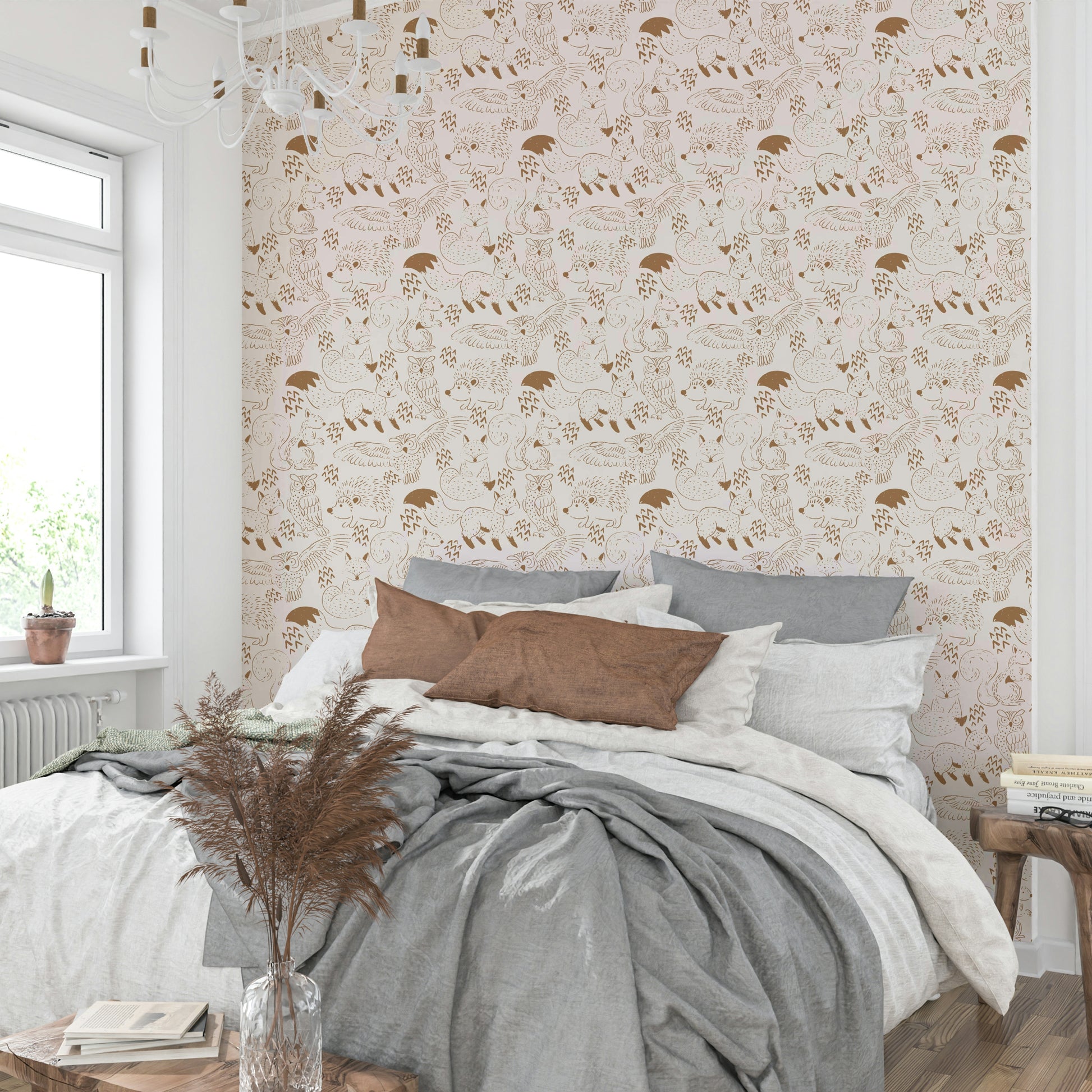 Woodland-themed nursery wallpaper in warm neutrals

