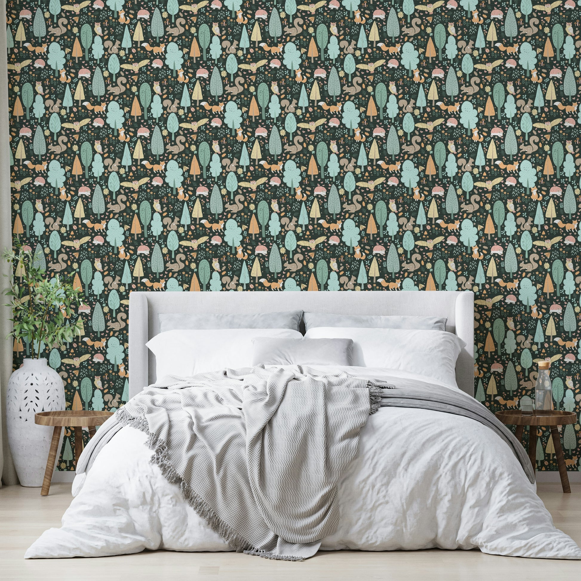 Dark green wallpaper featuring cute woodland creatures

