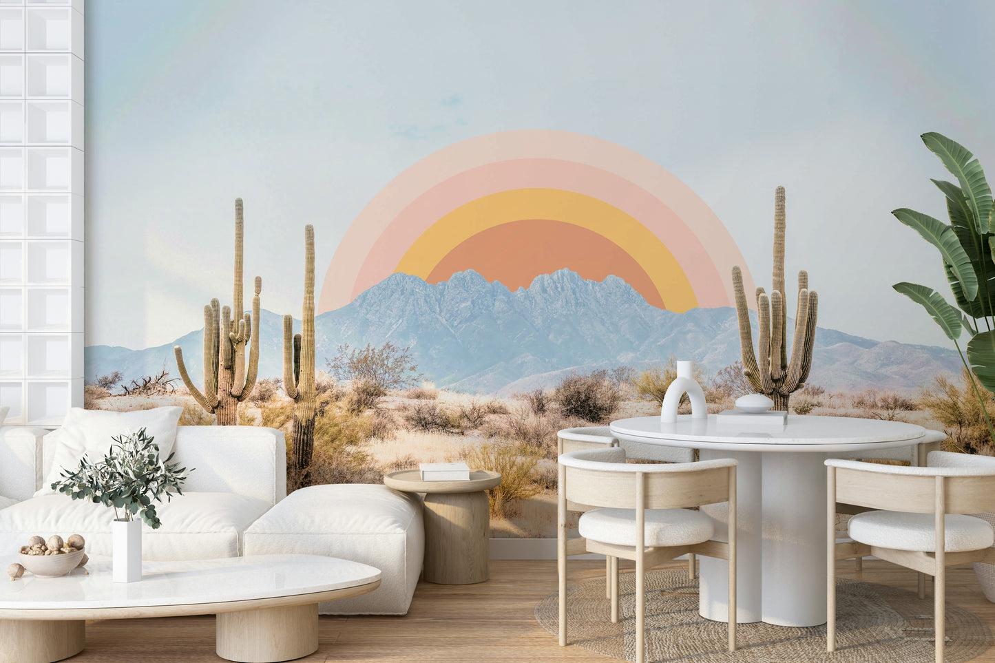 Warm sunrise mural over cactus-filled terrain

