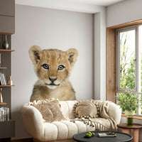 Playful baby lion wall mural for nursery décor


