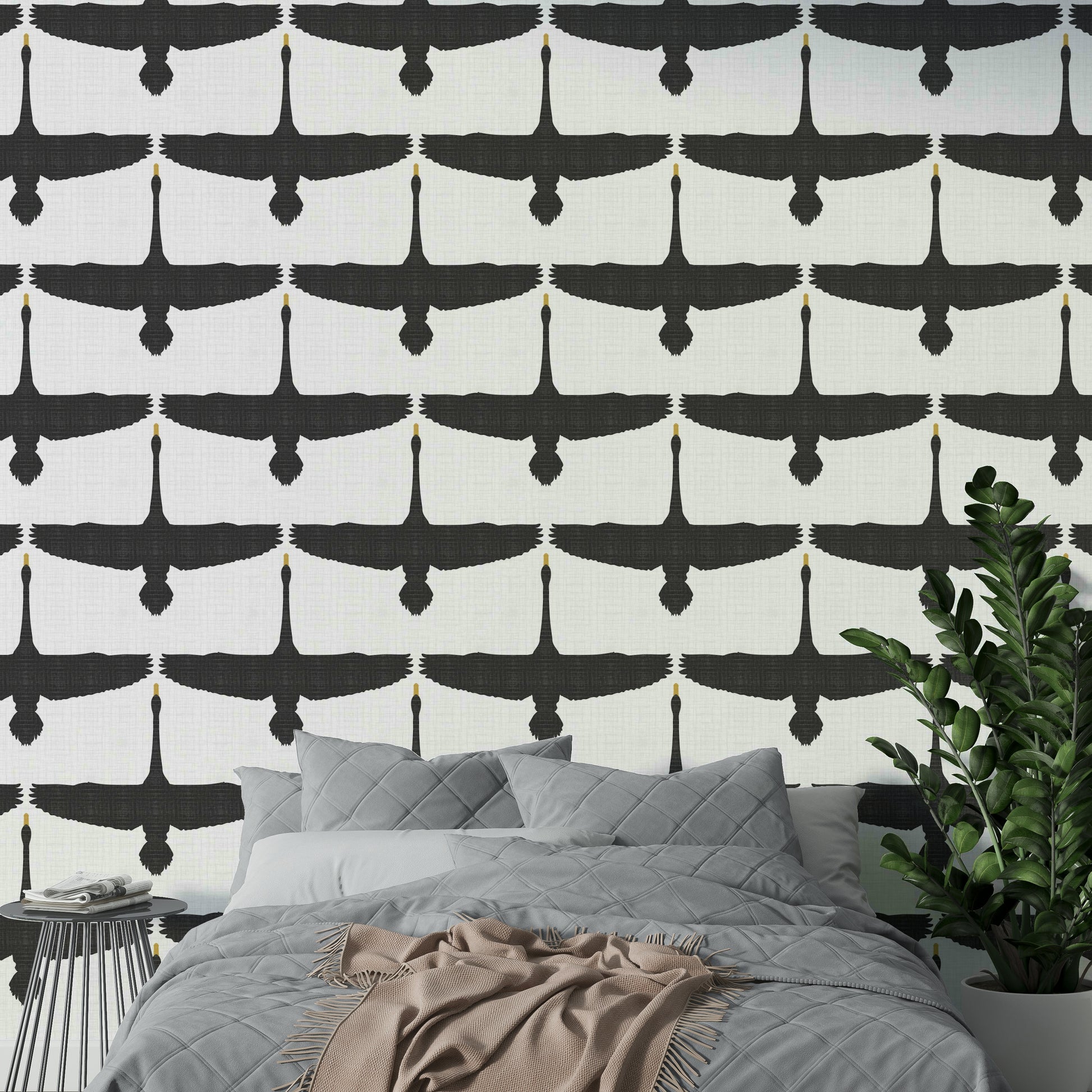 Graceful swans in motion on gray rustic wallpaper

