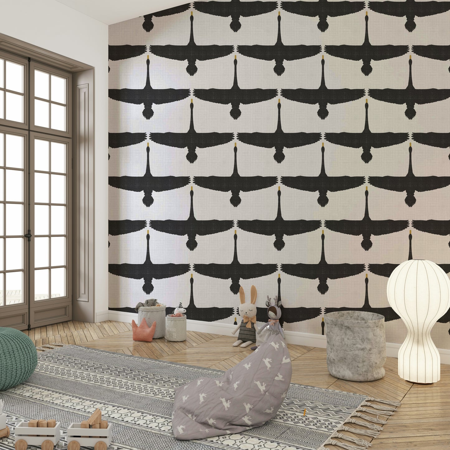 Swan silhouettes soaring across textured gray wallpaper

