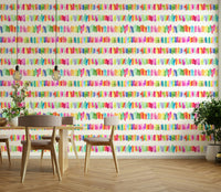 Hand-painted rainbow brushstroke wallpaper design


