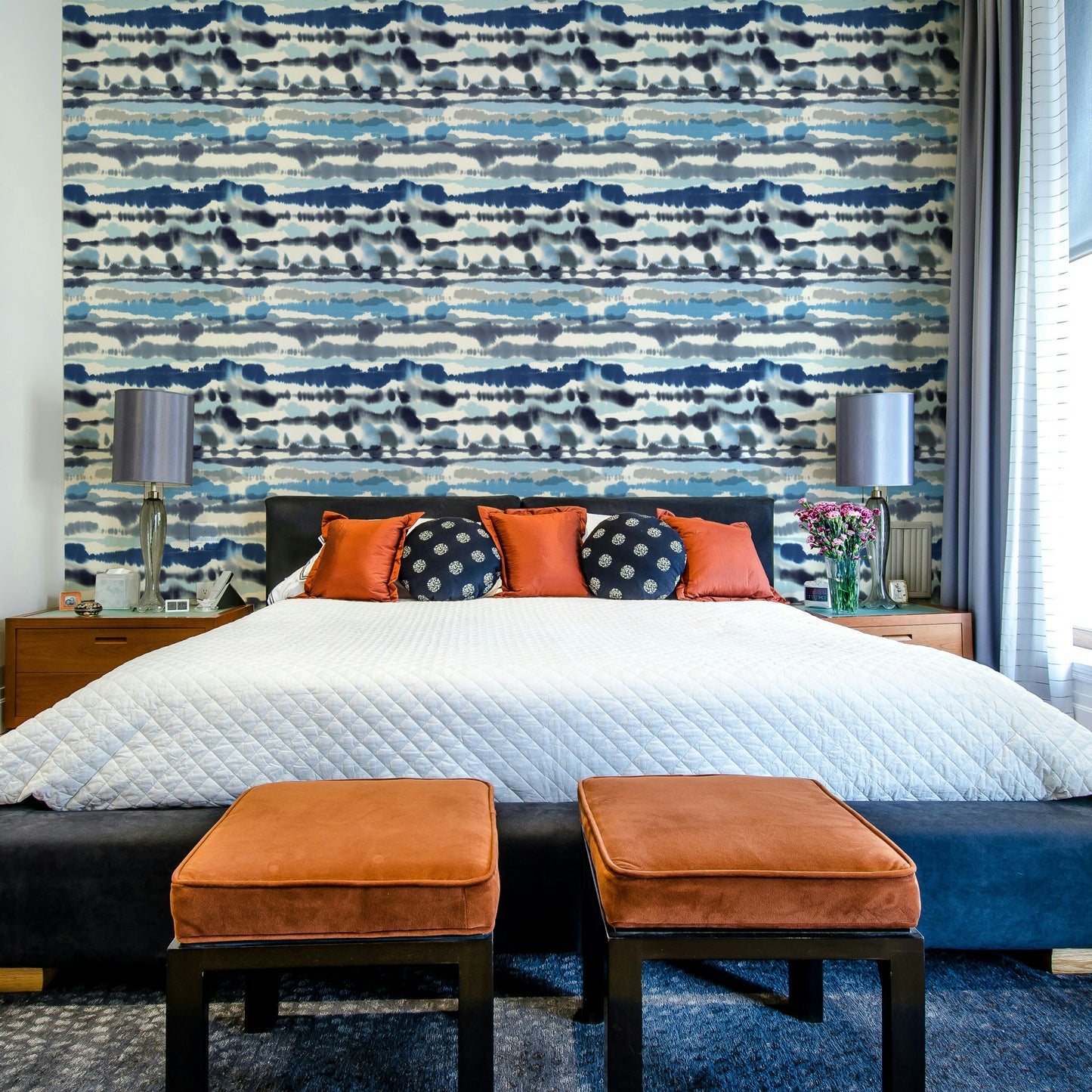 Ocean-themed wallpaper in soft blue wave curves

