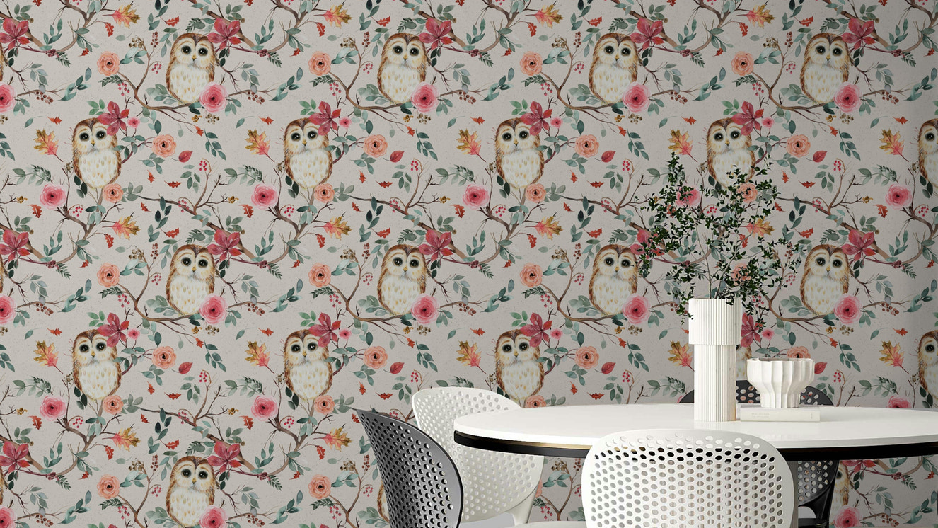 Owl perched on tree branch with green and red leaves wallpaper

