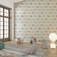 Ribbon & Bow wallpaper showing jungle animals and greenery

