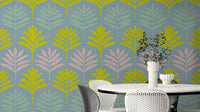Tropical leaf mural in soft, soothing tones

