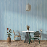 Gentle curved line wallpaper in blue tones

