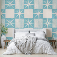 Mid-century modern starburst wallpaper in blue tones


