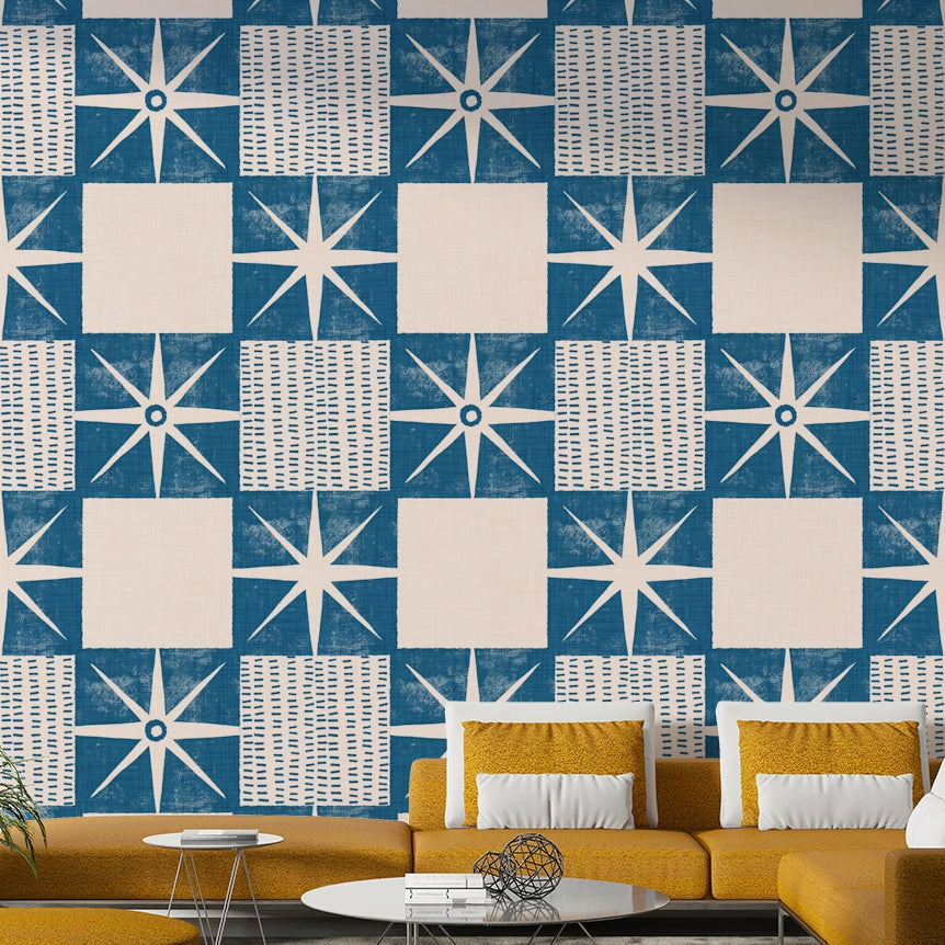 Indigo mid-century modern wallpaper with starburst pattern


