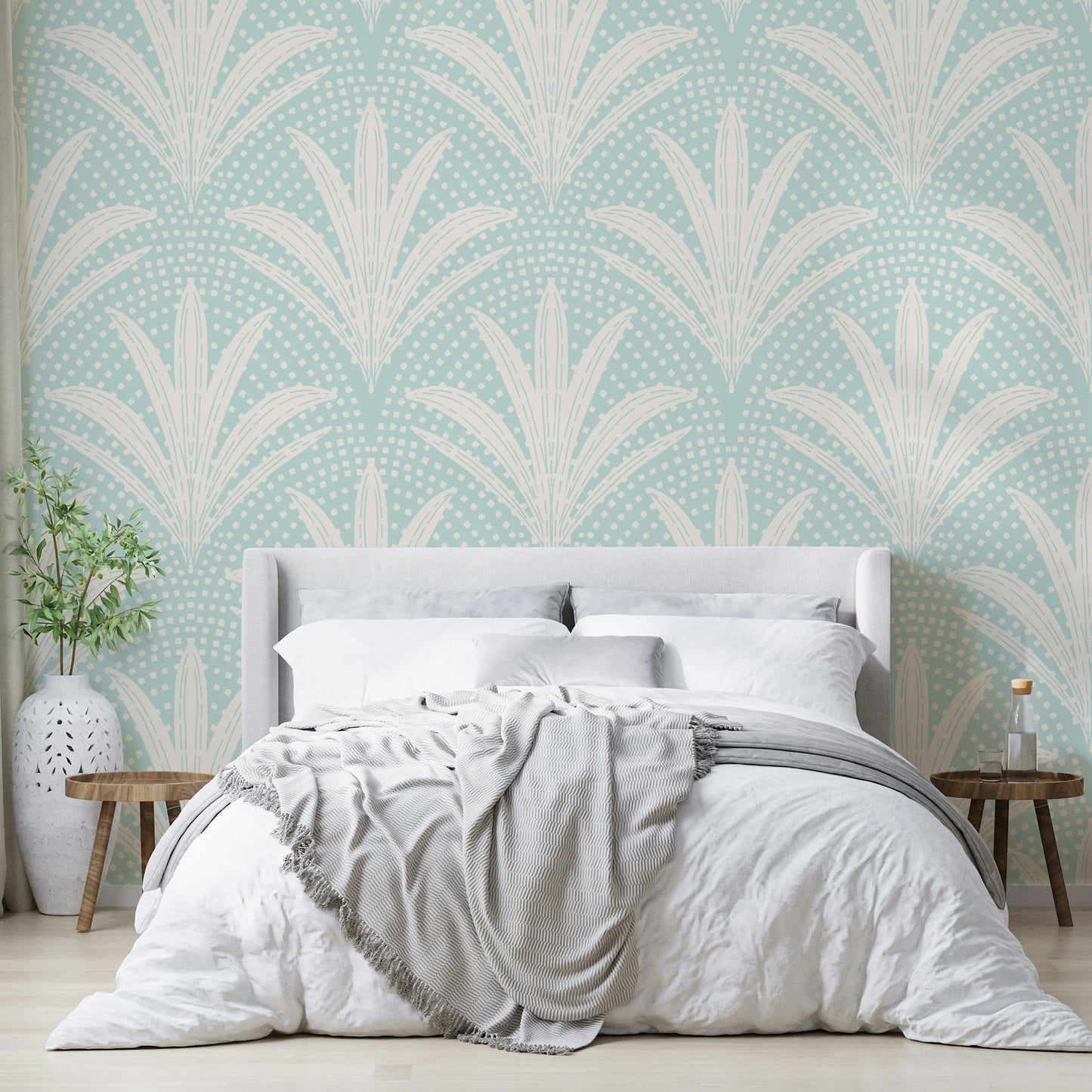 Boho style wallpaper featuring soft blue palm leaves

