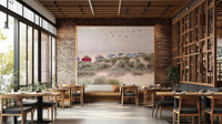 Tranquil beach mural wallpaper with soft beige and blue tones.

