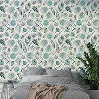 Beach-style wallpaper with watercolor blue seashell illustrations.

