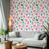 Hand-painted shell mural in soft pink and sandy hues.

