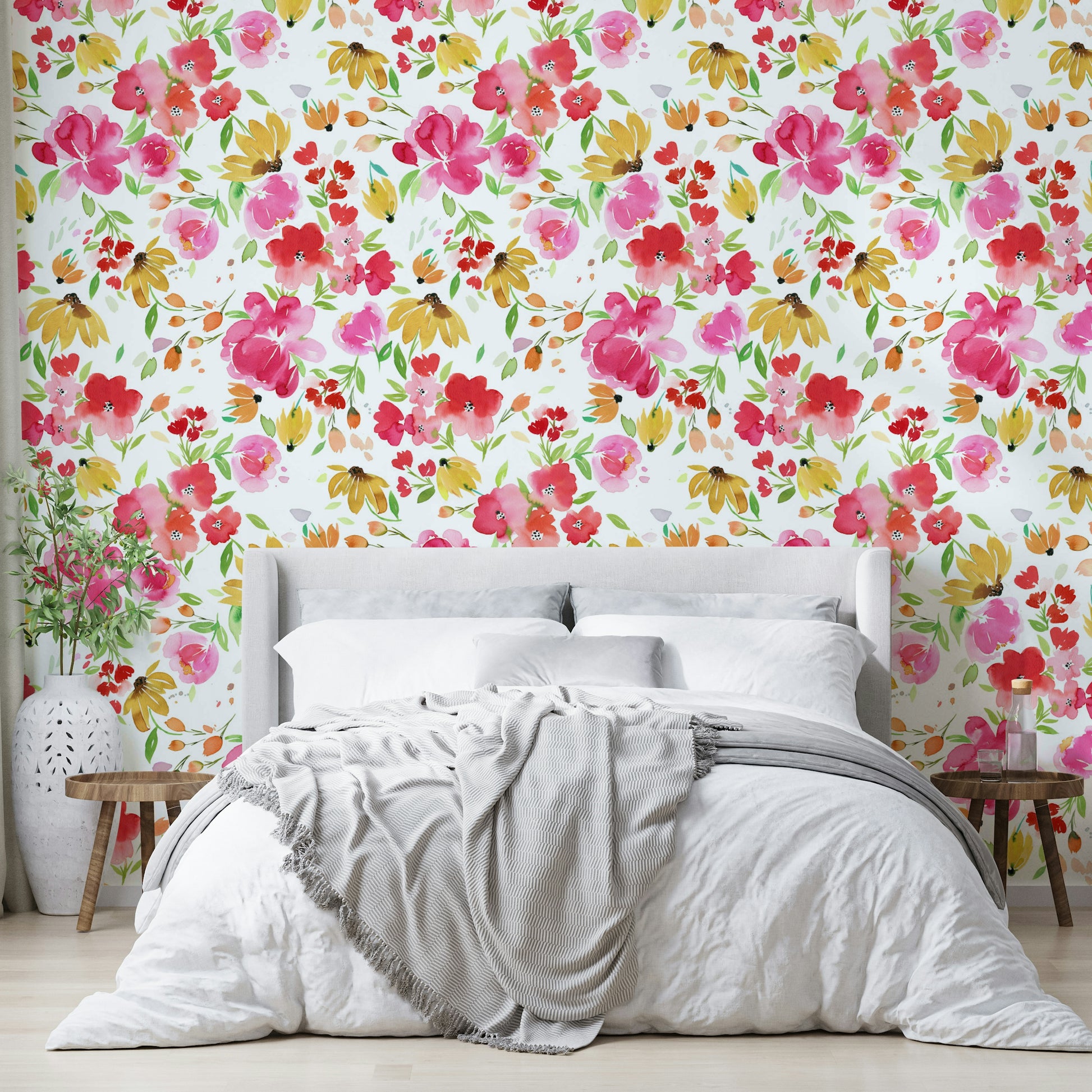 Close-up of pink and yellow blossoms set against a soft green backdrop.

