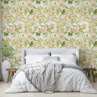 Vintage-inspired floral wallpaper with pink, cream, and red roses.

