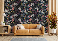 Lush tropical wallpaper with deep tones and contrasting bright flowers.

