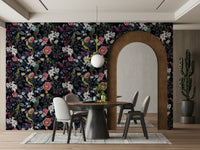Floral wallpaper mural with dark tones and intricate plant designs.

