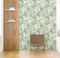 Lush botanical mural with tropical plants and delicate vines.

