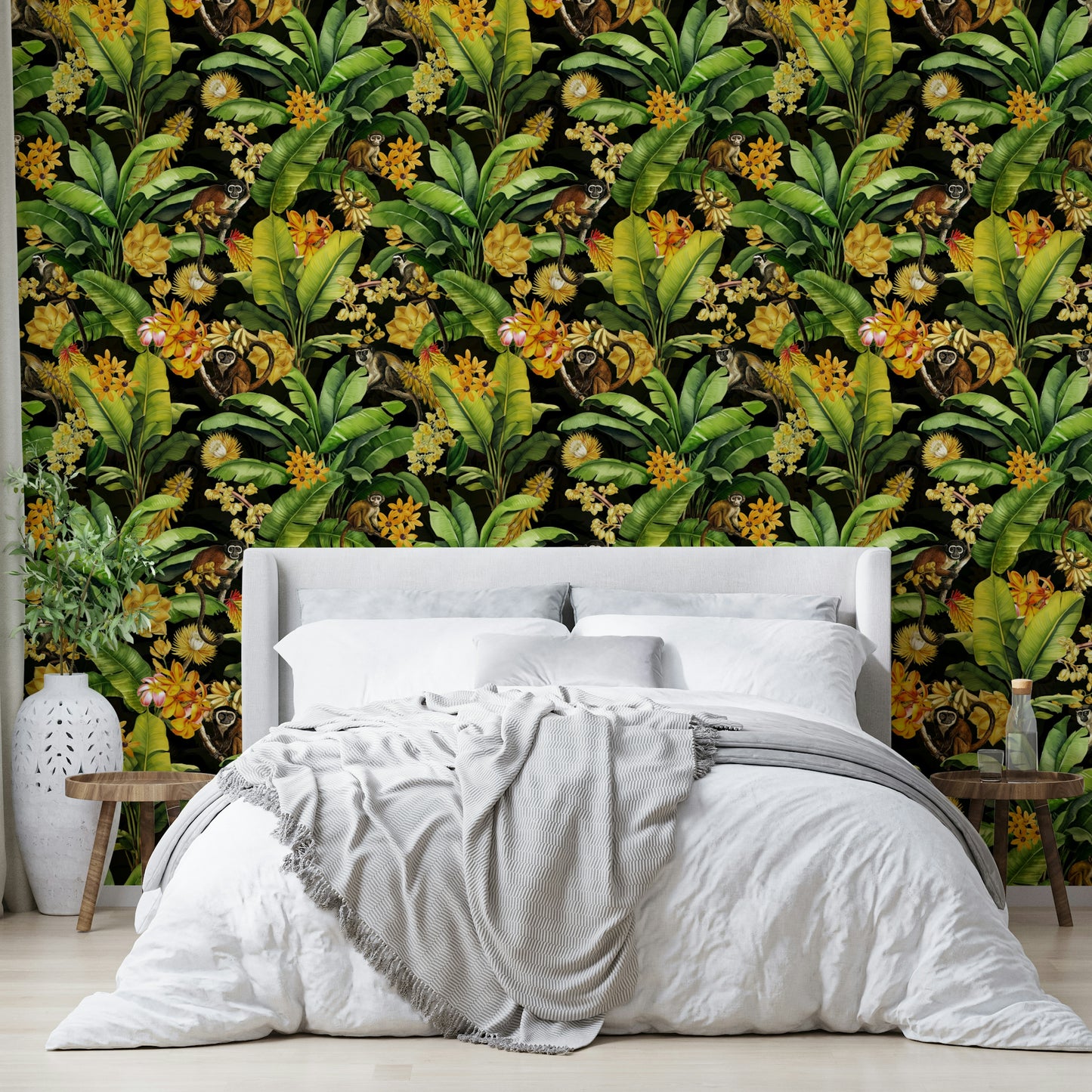 Fun, whimsical mural with monkeys in a jungle setting against dark tones.

