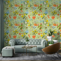 Close-up of tropical flowers and palm leaves in a vivid wallpaper design.

