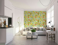 Wallpaper with exotic flowers, palm fronds, and lively jungle wildlife.


