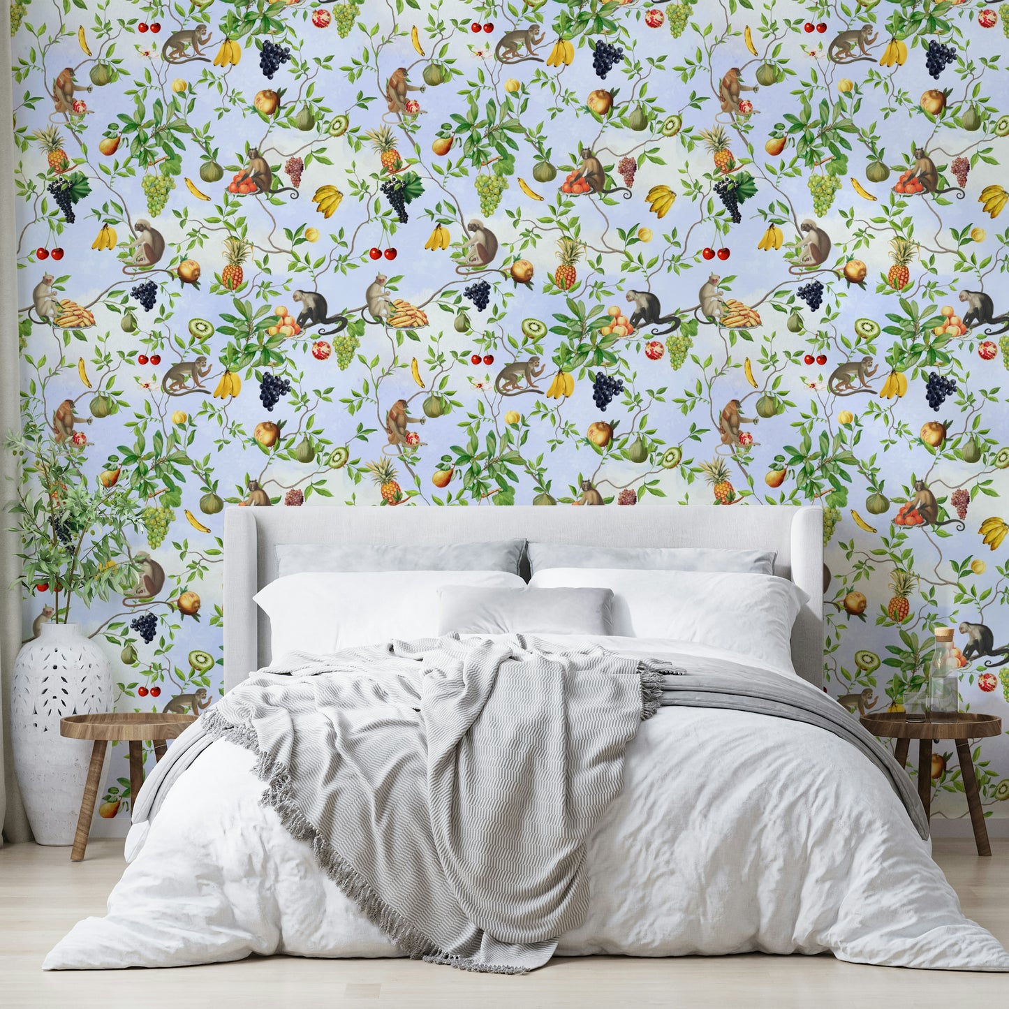 Vibrant jungle wallpaper with monkeys and colorful flora.

