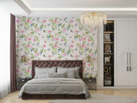 Wallpaper showing birds perched among flowers and leaves.

