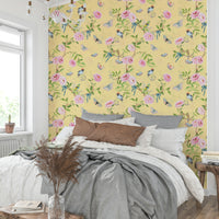 Vintage-inspired chinoiserie wallpaper with delicate bird illustrations.

